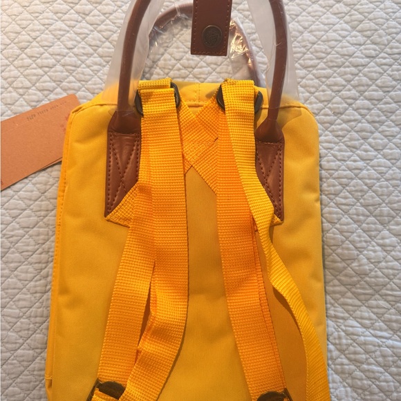 fjallraven kanken yellow mini backpack Fjallraven Kånken Sunflower Yellow Mini Backpack